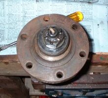 Early style half-shaft and drive flange.JPG